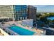 Beautiful exterior shot of building showing pool and lounge area at 150 E Robinson St # 405, Orlando, FL 32801