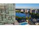 Lovely exterior shot of the high-rise showcasing a rooftop pool and lake views at 150 E Robinson St # 405, Orlando, FL 32801