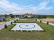 Aerial shot showcasing a helipad near a community at 16728 Bolsena Dr, Bella Collina, FL 34756