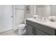 Stylish bathroom with modern vanity, white countertop, and sleek fixtures for a contemporary feel at 16728 Bolsena Dr, Bella Collina, FL 34756