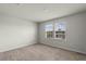 Bedroom with dual windows bringing in light at 17319 Million Lakes Ct, Clermont, FL 34714