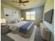 Serene bedroom with a plush bed and modern decor at 17319 Million Lakes Ct, Clermont, FL 34714