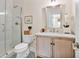 Bright bathroom with a glass shower, marble countertop, and stylish tile flooring at 1840 W Fawsett Rd, Winter Park, FL 32789