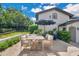 Patio dining area features outdoor seating perfect for entertaining with an outdoor kitchen at 1840 W Fawsett Rd, Winter Park, FL 32789