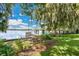 Picturesque waterfront property with seating and dock, perfect for relaxing and enjoying lake views at 1840 W Fawsett Rd, Winter Park, FL 32789