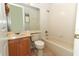 Clean bathroom with a sink, toilet, and bath at 1924 Stonecrest Ct, Orlando, FL 32825