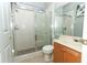 Clean bathroom with shower, glass door, and tiled floor at 1924 Stonecrest Ct, Orlando, FL 32825