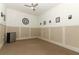 Neutral-colored bedroom featuring neutral carpeting, a ceiling fan, and base-board trim at 1924 Stonecrest Ct, Orlando, FL 32825