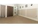 Empty bedroom featuring neutral carpeting and a neutral color scheme at 1924 Stonecrest Ct, Orlando, FL 32825