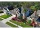 Beautiful two-story home with brick accents, lush landscaping, and mature palm trees at 1924 Stonecrest Ct, Orlando, FL 32825