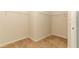 Empty walk-in closet with carpet floors and metal shelving at 1924 Stonecrest Ct, Orlando, FL 32825