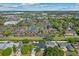 Expansive aerial view of a residential neighborhood featuring apartments, tennis courts and single-Gathering homes at 230 S Ranger Blvd, Winter Park, FL 32792