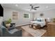 Comfortable bedroom showcasing a ceiling fan, window for natural light, and stylish furniture arrangement at 230 S Ranger Blvd, Winter Park, FL 32792