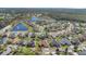 High angle aerial view of a well-planned residential community with lush greenery and scenic ponds at 2509 Chapala Dr, Kissimmee, FL 34746