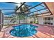 Screened-in pool area with a beautiful pool and well-maintained patio at 2509 Chapala Dr, Kissimmee, FL 34746