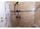 Shower with a shower head, tile and built in shelves at 2601 Gold Dust Cir, Kissimmee, FL 34744