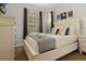 Charming bedroom features a queen bed and neutral tones at 2774 Almaton Loop # 101, Kissimmee, FL 34747