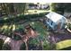 Aerial view of backyard landscaping with potting shed and brick patio at 3431 Dawn Ct, Lake Mary, FL 32746