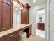 Bathroom vanity with marble countertop and dark wood cabinets at 3431 Dawn Ct, Lake Mary, FL 32746