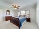 Cozy bedroom with large window and a queen bed at 3431 Dawn Ct, Lake Mary, FL 32746