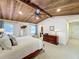 Spacious main bedroom with wood ceiling, ceiling fan, and en suite bathroom access at 3431 Dawn Ct, Lake Mary, FL 32746