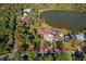 An aerial view showcasing the home's sprawling lot and proximity to a serene lake at 372 Rest Haven Rd, Geneva, FL 32732