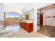 Bathroom showcases dual sinks, a bidet, expansive windows, and tile flooring at 372 Rest Haven Rd, Geneva, FL 32732