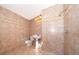 Cozy full bathroom with tile flooring and walls, a pedestal sink, and a standing shower at 372 Rest Haven Rd, Geneva, FL 32732