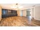 Elegant dining area boasting custom built-in shelving and a decorative light fixture at 372 Rest Haven Rd, Geneva, FL 32732