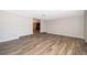 Spacious living room featuring wood-look flooring and neutral color palette at 372 Rest Haven Rd, Geneva, FL 32732