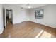 Bedroom with hardwood flooring, window, ceiling fan and closet at 5030 Creekview Ln, Lakeland, FL 33811