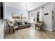 Comfortable living room with stylish decor and a light blue accent wall at 5283 Wildwood Way, Davenport, FL 33837