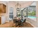 Breakfast nook with round table and natural light, overlooking the pool at 600 Statenville Ct, Ocoee, FL 34761