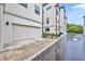 Modern townhome with two-car garage, and well maintained landscaping at 62 W Jersey St # 13, Orlando, FL 32806