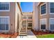 Exterior stairs lead to the residences, highlighting accessibility and design at 645 Stafford Ter # 162, Altamonte Springs, FL 32714