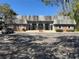 Well-maintained building featuring a brick facade, and ample parking providing easy access for residents and visitors at 7309 Daniel Webster Dr # D, Winter Park, FL 32792