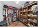 Spacious walk-in closet with custom wood shelving for clothing and accessories at 777 S Denning Dr # B, Winter Park, FL 32789