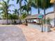 Outdoor kitchen and bar area, perfect for entertaining, located next to the pool at 814 Chamberlin Trl, St Cloud, FL 34772