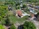 Aerial view of home showing roof and expansive lawn, surrounded by neighboring houses and mature trees at 9272 Gotha Rd, Windermere, FL 34786