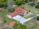 Overhead angle of this home showing a large lot, two-car garage, and neutral exterior at 9272 Gotha Rd, Windermere, FL 34786