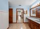 Bathroom featuring a vanity, tile floor, and doorway view to other rooms at 9272 Gotha Rd, Windermere, FL 34786