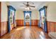 Cozy dining area filled with natural light, complemented by charming blue curtains at 9272 Gotha Rd, Windermere, FL 34786