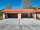 Spacious three-car garage featuring two open doors and a clean concrete floor for easy vehicle access at 9272 Gotha Rd, Windermere, FL 34786