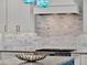 Elegant kitchen backsplash featuring stylish tiles, complemented by stainless steel appliances at 10148 Chiltern Garden Dr, Orlando, FL 32827