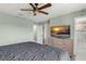 Spacious bedroom with view to the bathroom with a glass shower, creating a serene and inviting atmosphere at 11844 Pulitzer Pl, Orlando, FL 32832