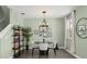 Cozy dining area with modern decor and lots of light at 11844 Pulitzer Pl, Orlando, FL 32832