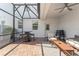Relaxing covered lanai features brick flooring, ceiling fan, grill and a comfortable seating area at 11844 Pulitzer Pl, Orlando, FL 32832