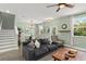 Comfortable Gathering room with open layout, staircase and dining area at 11844 Pulitzer Pl, Orlando, FL 32832
