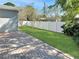 Spacious backyard with brick paver patio, manicured lawn, and privacy fence at 120 Mayfair Ct # 120, Sanford, FL 32771