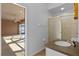 Bright bathroom featuring a shower and a vanity with a granite countertop at 1380 Normandy Heights Cir, Winter Haven, FL 33880